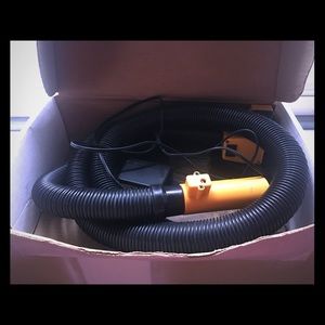 Flowbee home hair cutter